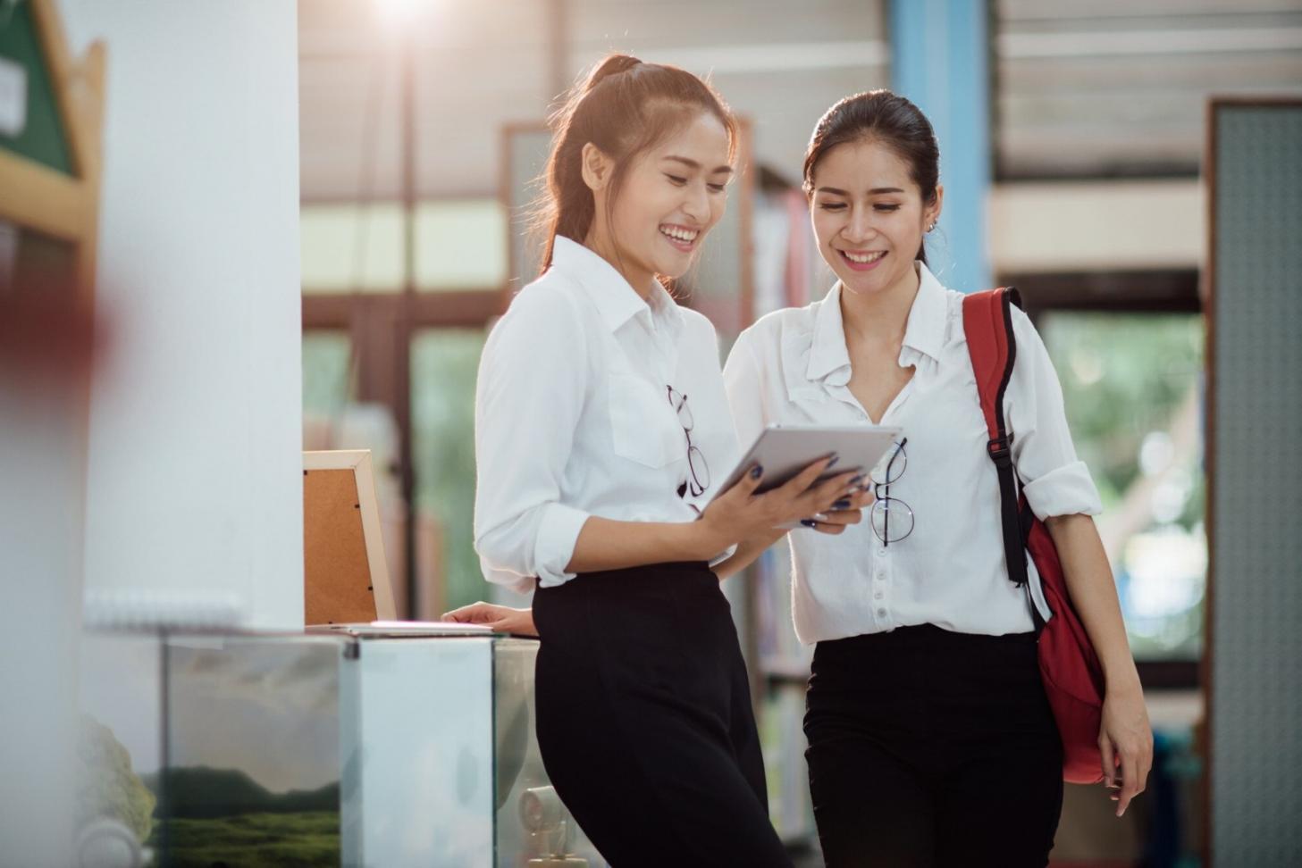Team collaboration in modern workspace showing diverse professionals working together