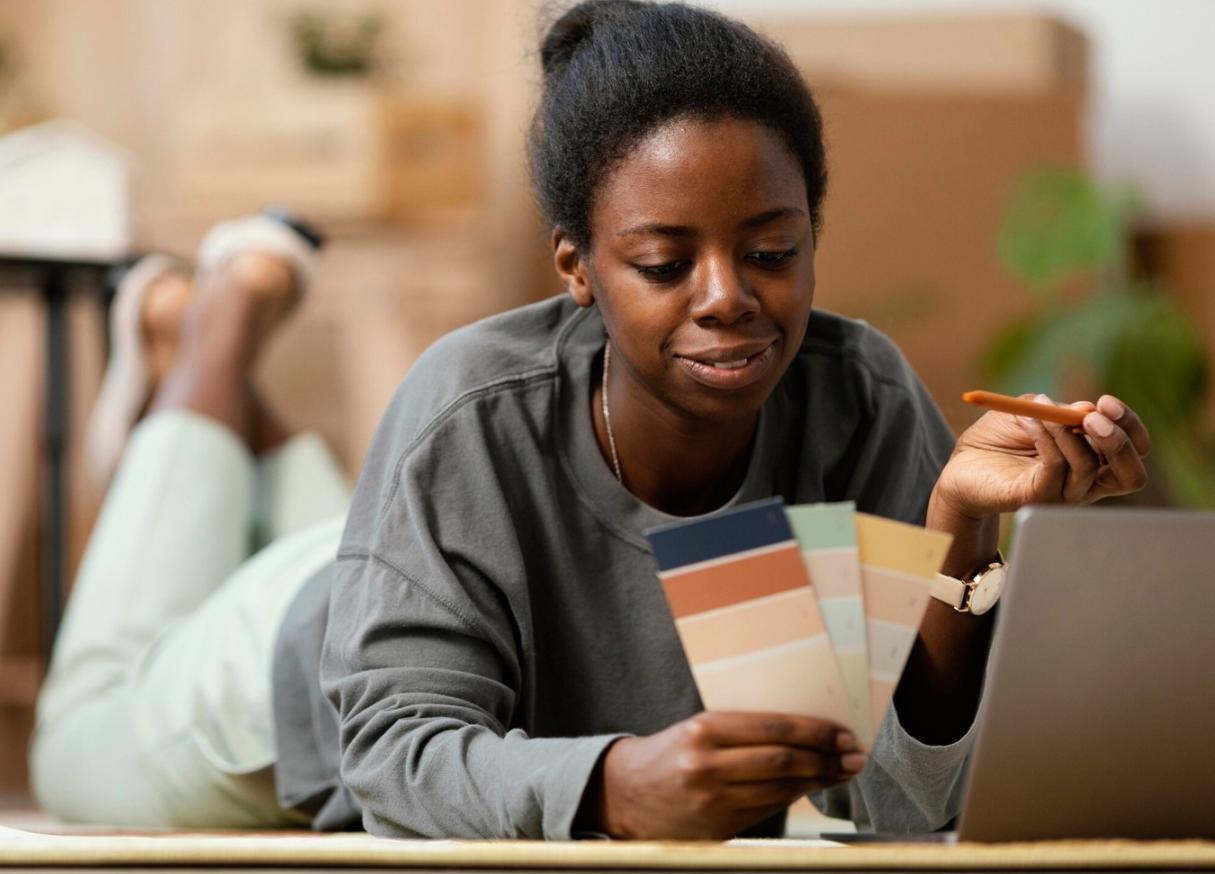 Collaborative workspace showing team members working on venture development strategies